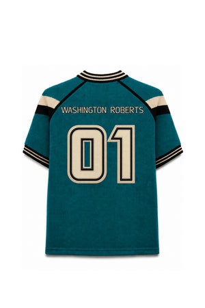 A teal short-sleeve jersey shown from the back, featuring 'WASHINGTON ROBERTS' and the number '01' in cream with black outlines. The jersey has cream and black striped details on the collar and sleeve cuffs, set against a plain white background.