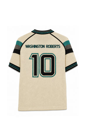 A cream-colored short-sleeve jersey shown from the back, featuring 'WASHINGTON ROBERTS' and the number '10' in black with teal outlines. The jersey has teal and black striped details on the shoulders and sleeves.